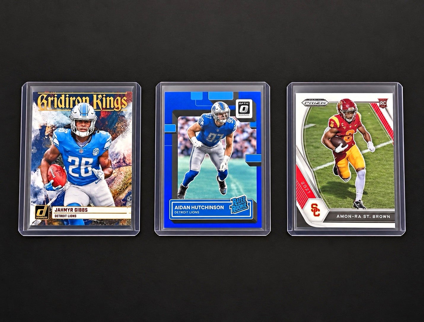 Detroit Lions 3 Card Lot - Gibbs RC | Hutchinson Optic RR #/179 | St. Brown RC